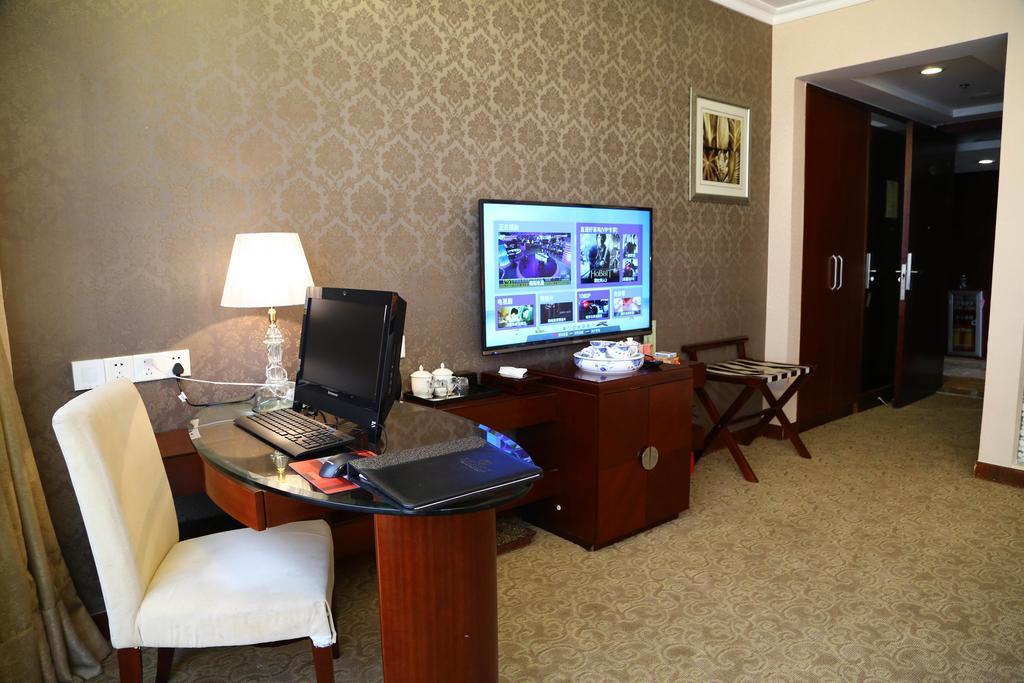 Long Zhou Grand Hotel Kuangcsou Szoba fotó