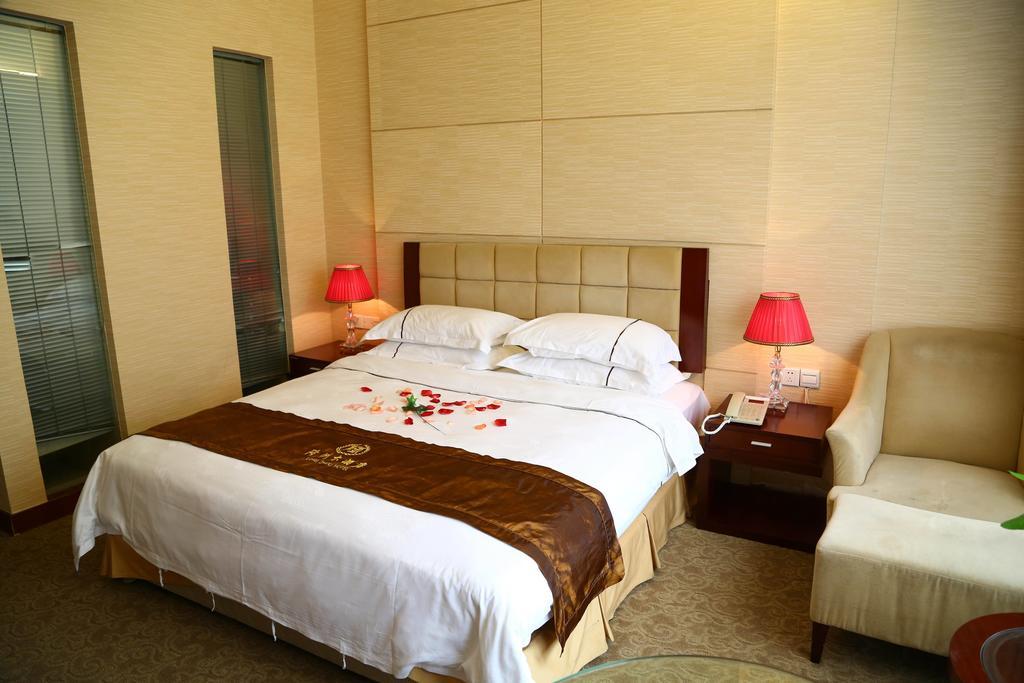 Long Zhou Grand Hotel Kuangcsou Szoba fotó