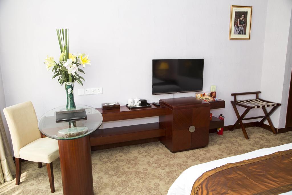Long Zhou Grand Hotel Kuangcsou Szoba fotó