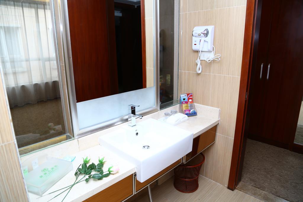 Long Zhou Grand Hotel Kuangcsou Szoba fotó