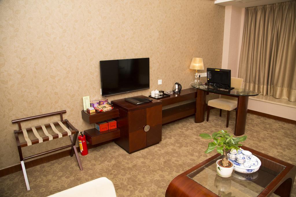 Long Zhou Grand Hotel Kuangcsou Szoba fotó