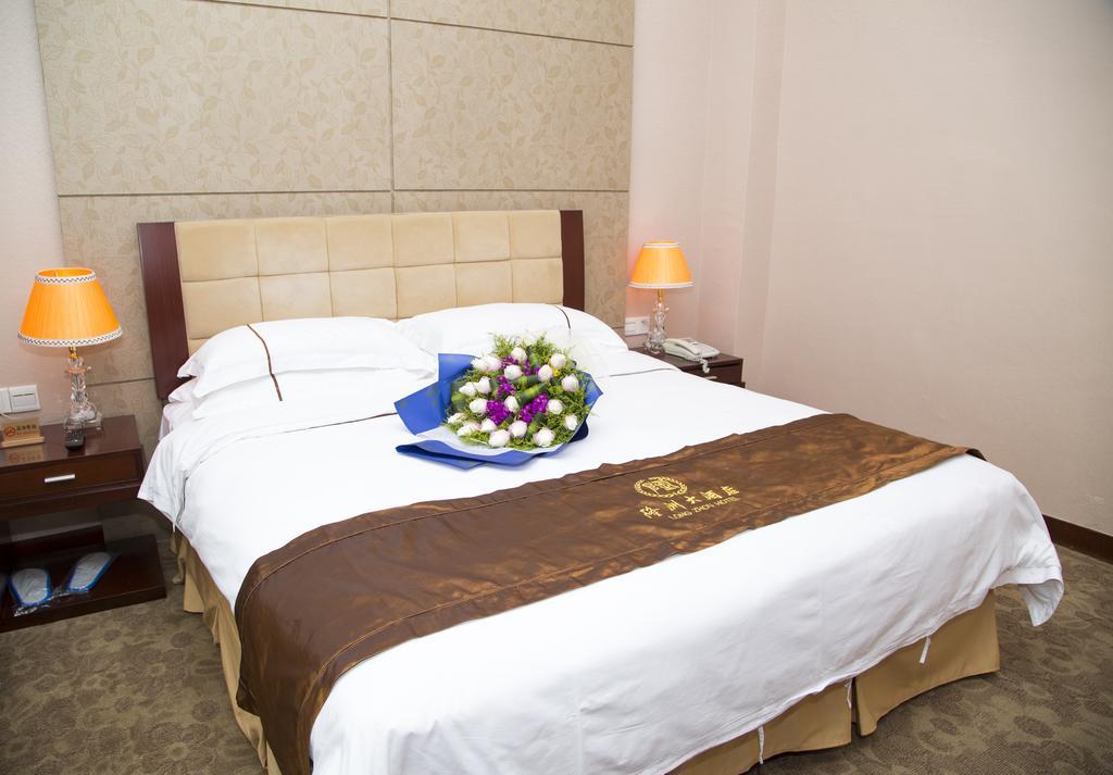 Long Zhou Grand Hotel Kuangcsou Szoba fotó