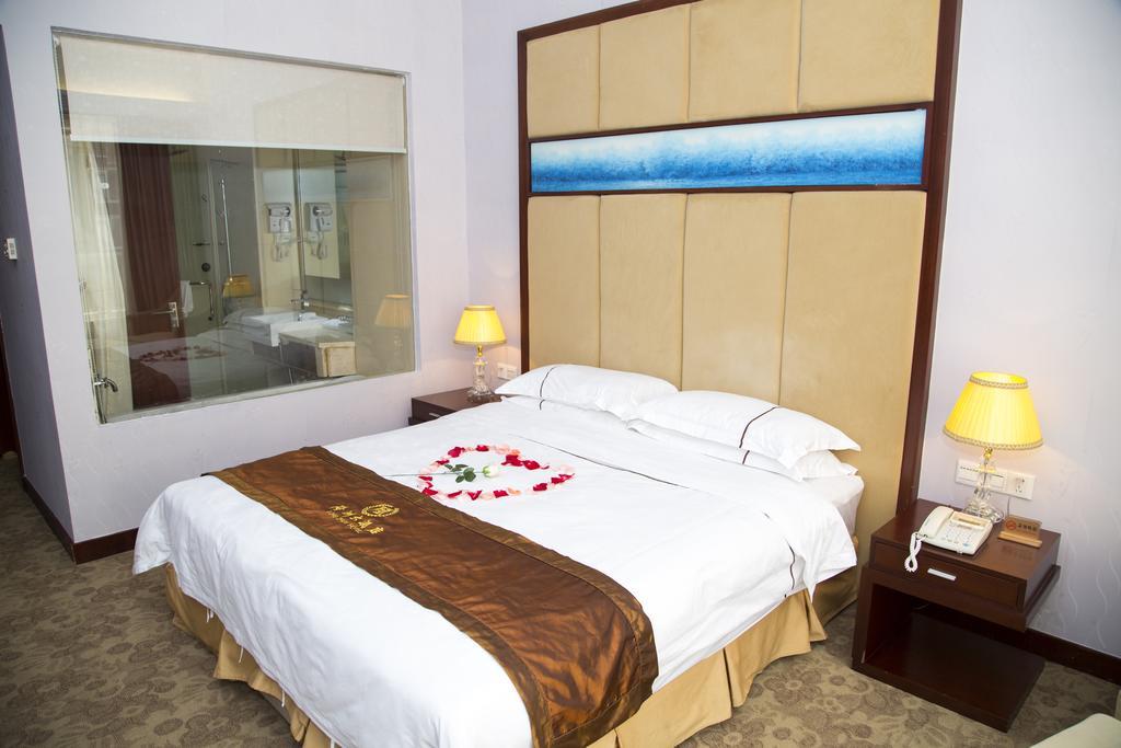 Long Zhou Grand Hotel Kuangcsou Szoba fotó
