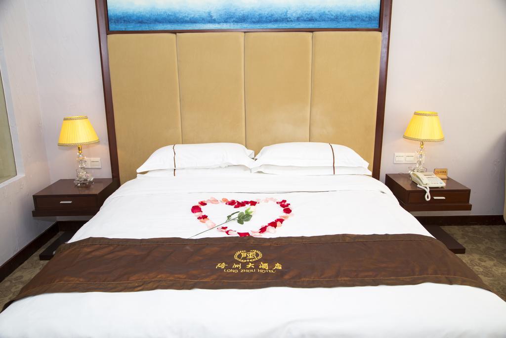 Long Zhou Grand Hotel Kuangcsou Szoba fotó
