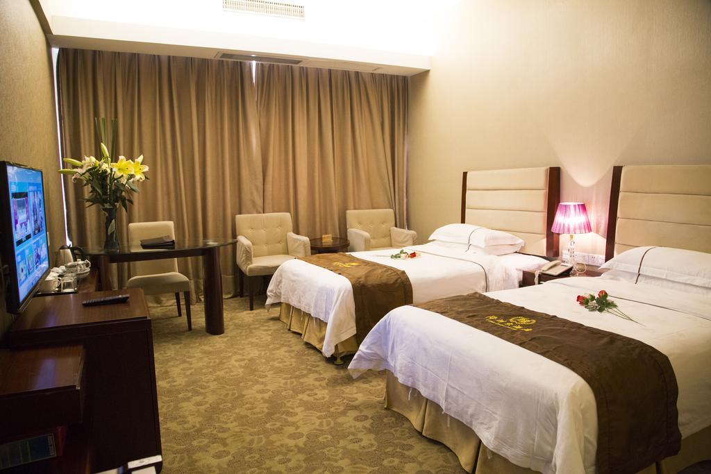 Long Zhou Grand Hotel Kuangcsou Szoba fotó