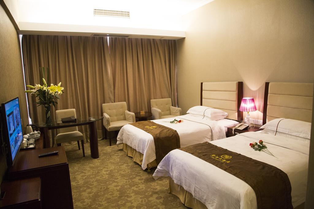 Long Zhou Grand Hotel Kuangcsou Szoba fotó