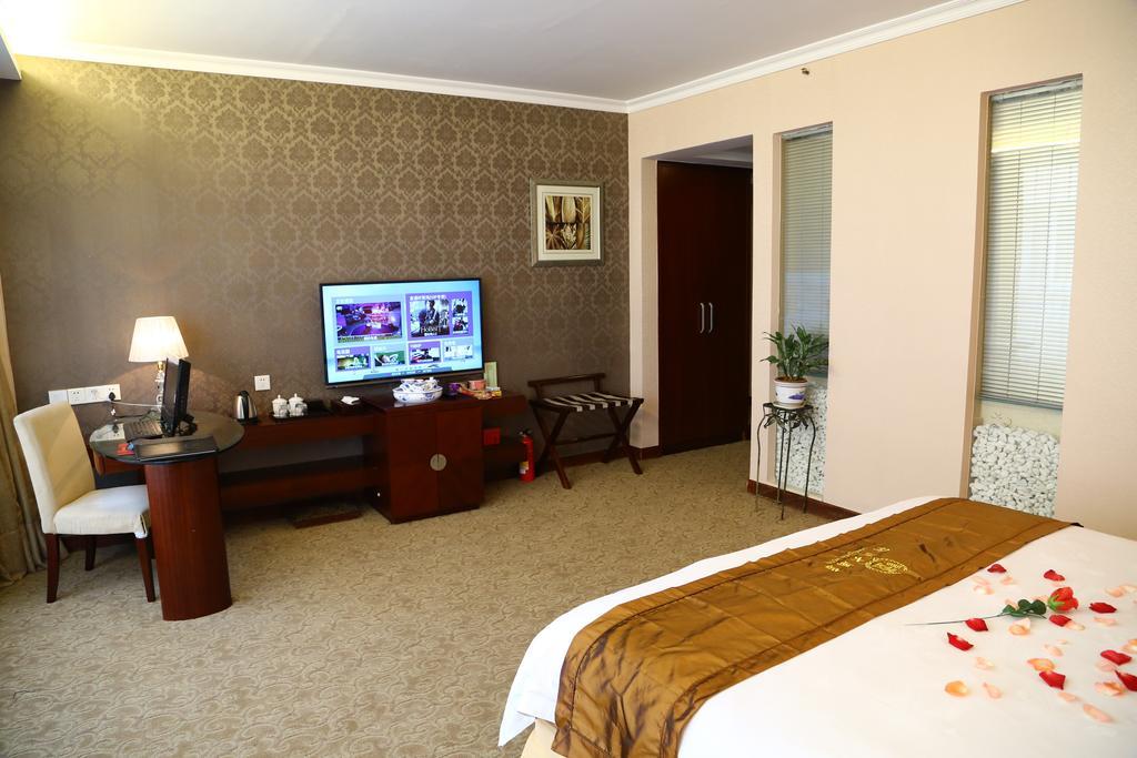 Long Zhou Grand Hotel Kuangcsou Szoba fotó