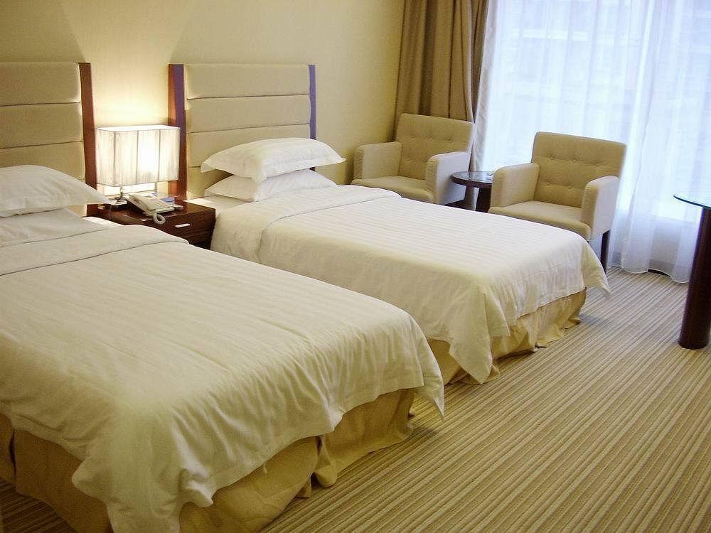Long Zhou Grand Hotel Kuangcsou Kültér fotó